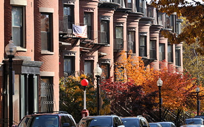 A row of brick Victorian houses in Boston's South End neighborhood