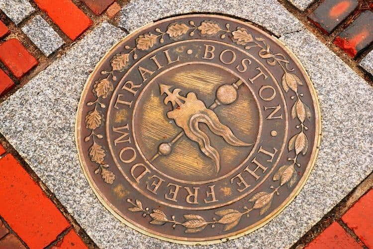 Freedom Trail sign on ground